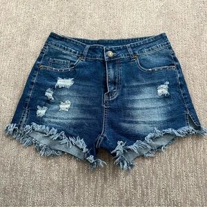 Dark blue Jean shorts, raw hem. Size medium